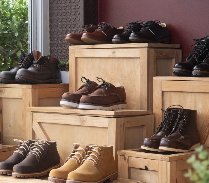 Men fashion shoes leather on the wooden box in the store. Men fashion shoes leather on the wooden box in the store.